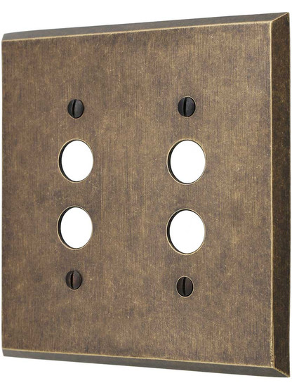 Traditional Forged Brass Double Gang Push Button Switch Plate in Antique Brass.